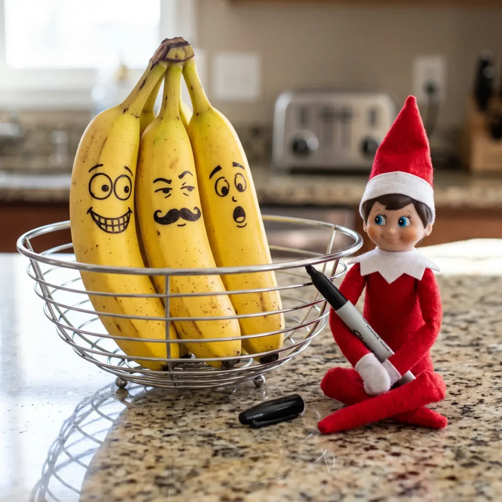 Bananas with funny faces drawn in marker sitting next to a scout elf holding a pen.